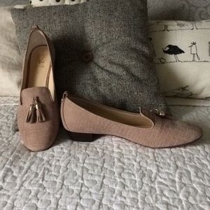 Reptile textured leather tan loafer.